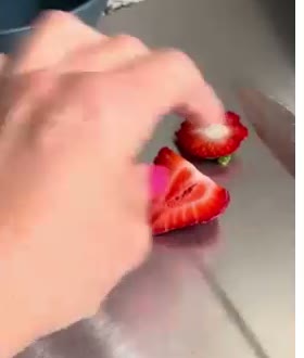 Cutting strawberries on the Katori board
